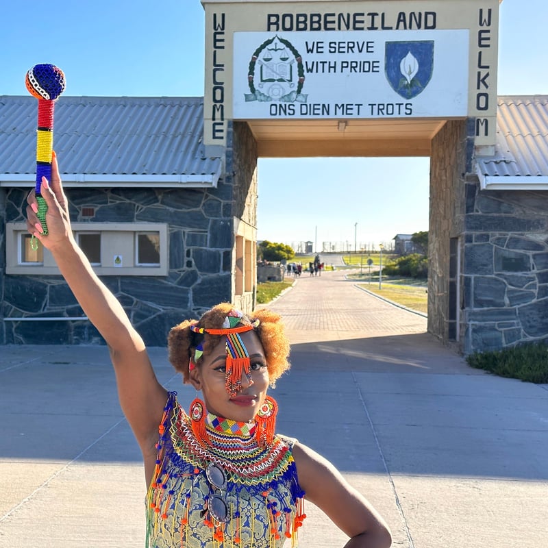 Former political prisoner guiding visitors through Robben Island prison tour